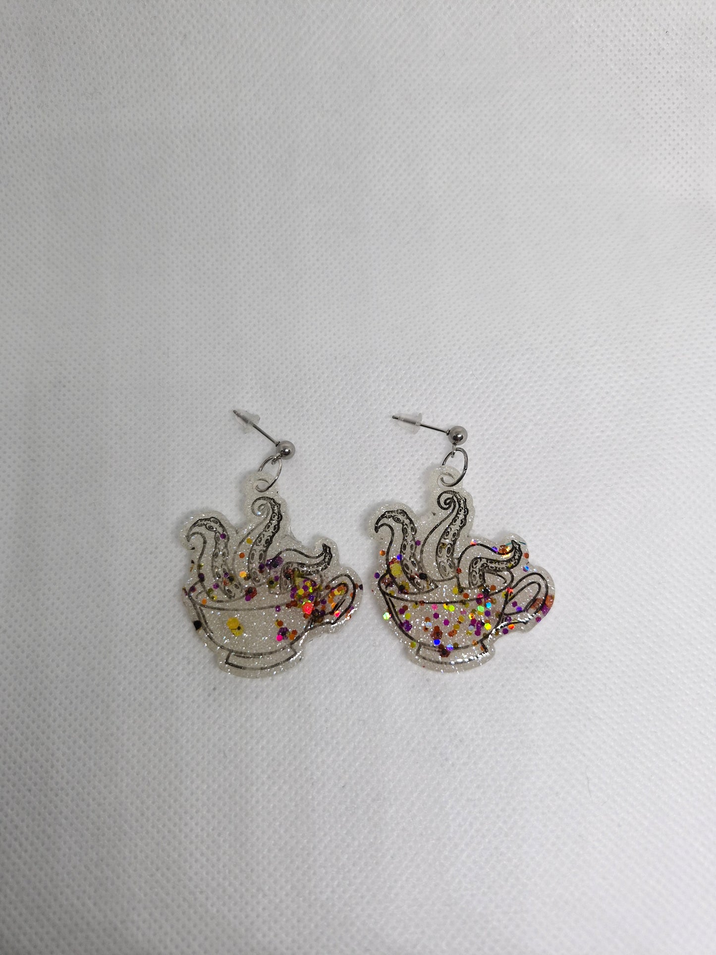 Kraken In a Cup dangle holographic white glitter dangle earrings