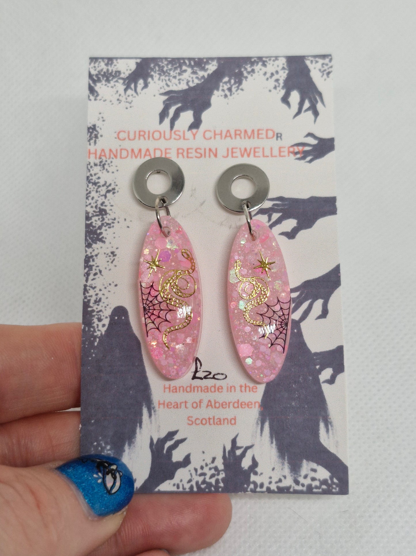 Pink Glitter Oblong Snake and spiderweb Dangle Earrings