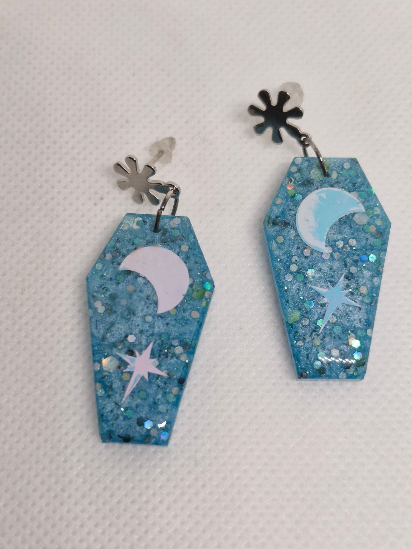 Blue Glitter Coffin and star dangle earrings