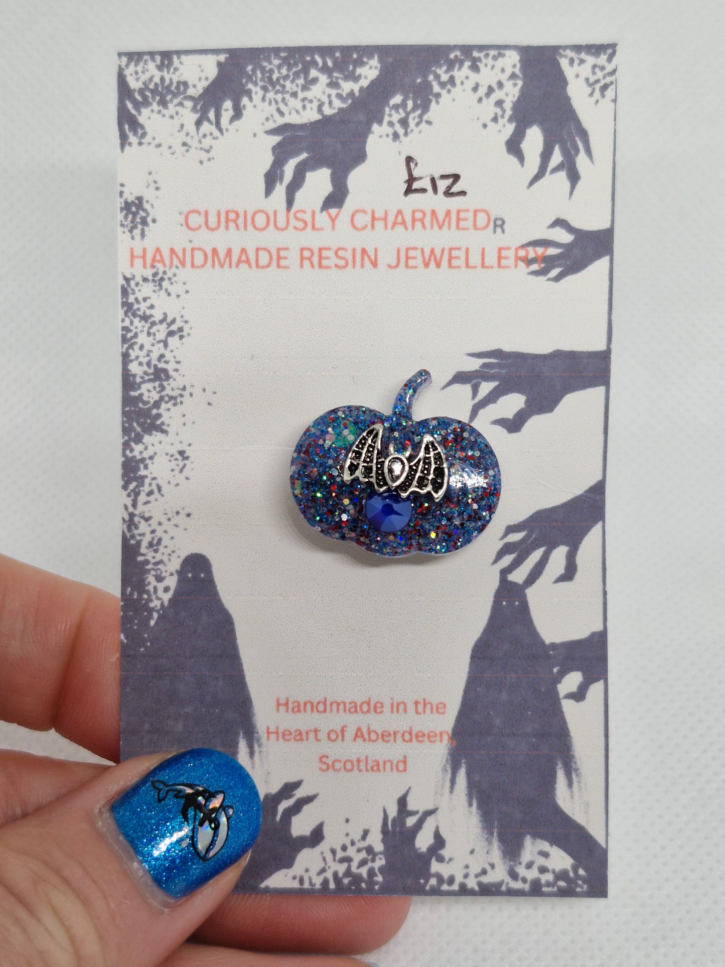Small Blue Glitter Pumpkin Brooch with small Gothic Bat Charm