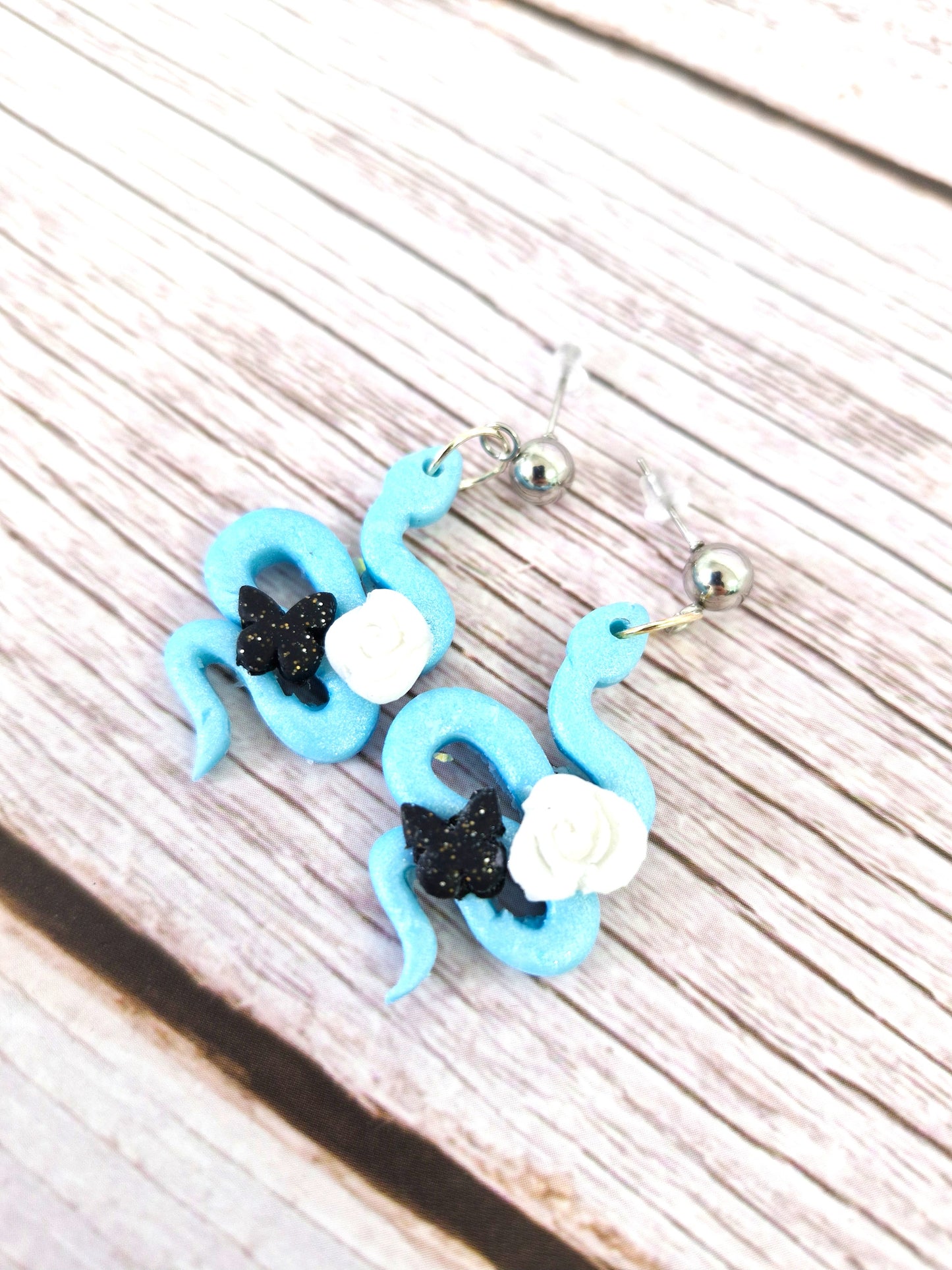 Light Blue Snake with rose and butterfly Polymer Dangle Earrings