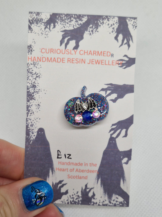 Small Blue Glitter Pumpkin Brooch with small bat charm